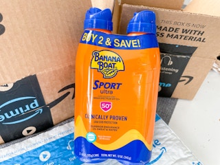a two pack of banana boat sunscreen sitting in front of an amazon box