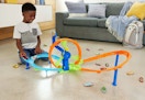 child playing with the Hot Wheels Rapid Launch & Loop set