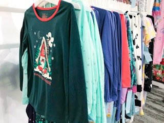 Cat & Jack pajamas hanging on hangers at Target