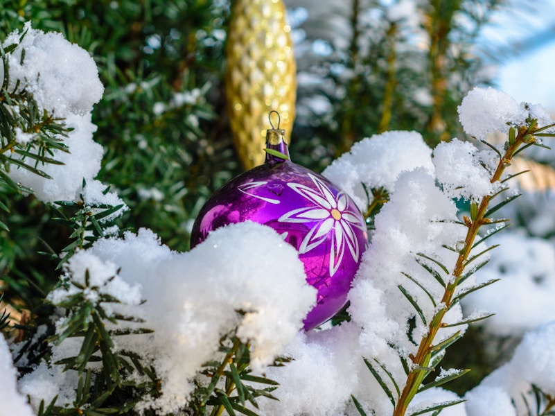 A Ukranian christmas ornament on a tree