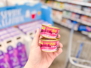 2 California Scent Auto Air Freshener Cans held up in Walmart store