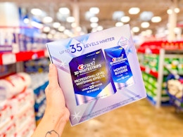 hand holding a crest 3d whitestrips kit