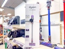 dyson v9 cordless stick vacuum sitting on a target shelf