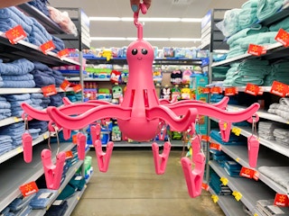 hand holding octopus drying hanger at walmart