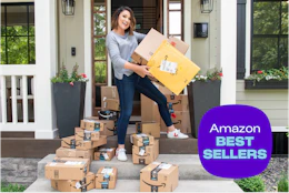 amazon boxes on a porch with joanie holding amazon packages