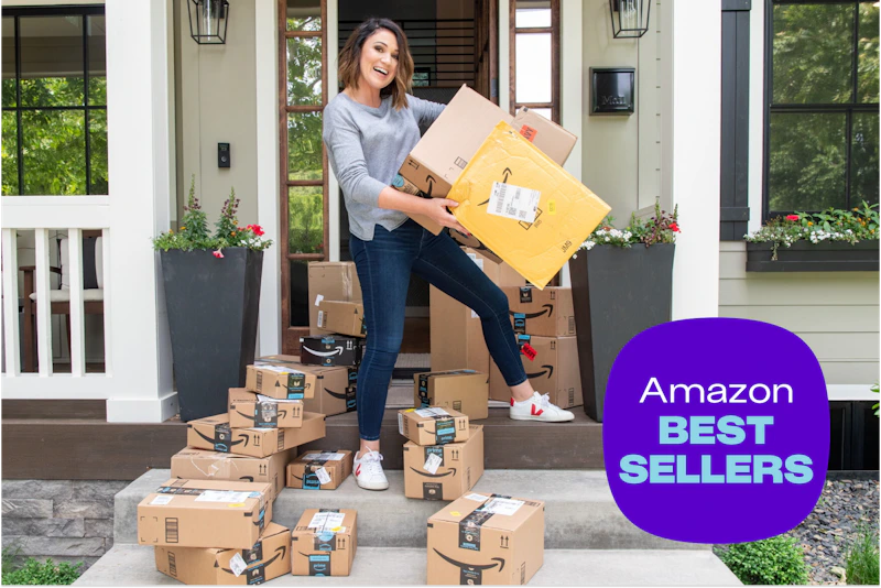 amazon boxes on a porch with joanie holding amazon packages