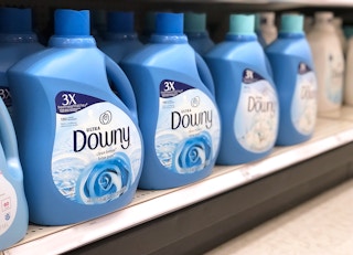 large bottles of downy liquid fabric softener on a shelf