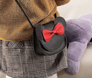 someone wearing the jane Bowknot Shoulder Bag With Cartoon Mouse Ears in black