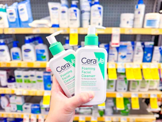 hand holding hydrating facial cleansers 