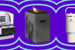 ice maker, black fire table, and Stanely tumbler