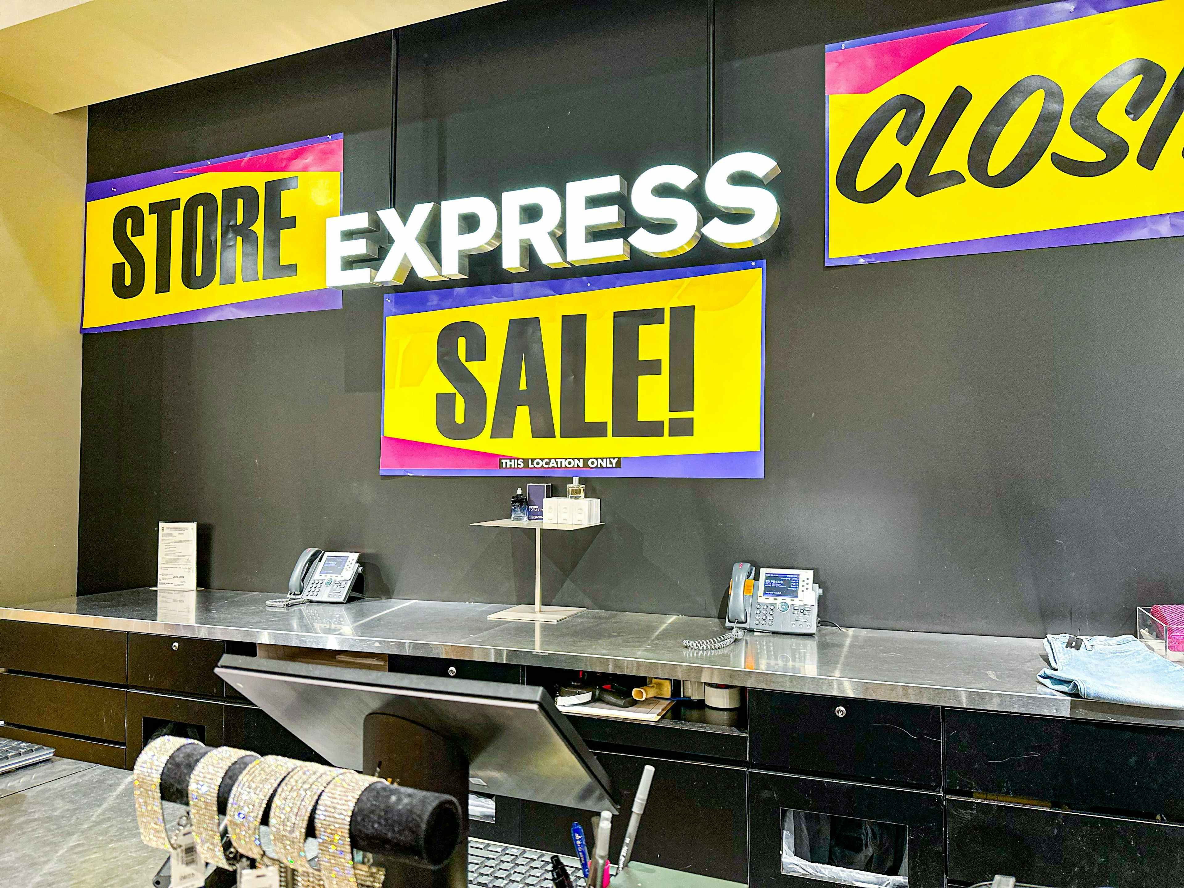 express store closings liquidation signage
