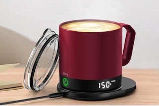 a burgundy self-heating coffee mug
