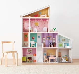 dollhouse with furniture in a room