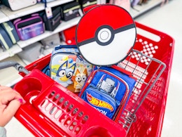 lunch bags sitting in a target cart