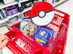 hand pushing lunch-bags in target cart