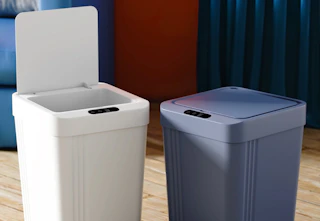 white and blue mini trash cans