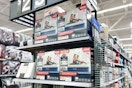 The Intex Queen air mattress on a shelf at Walmart