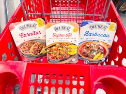 3 del real foods entrees sitting in a target cart