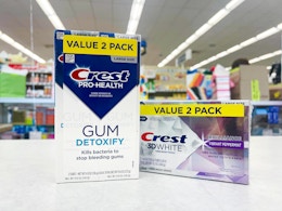 2 pack of crest premium toothpaste on a shelf