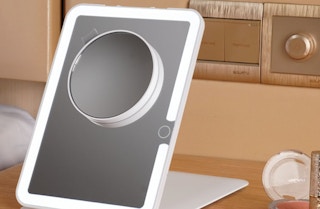 a travel mirror on a table