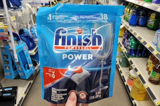 hand holding finish powerball tabs at dollar general