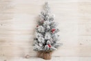 Lifestyle image of the Astella 2-foot Artificial Christmas Tree
