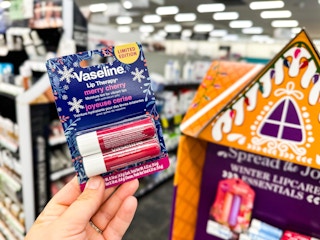 hand holdingvaseline merry cherry lip blam two pack