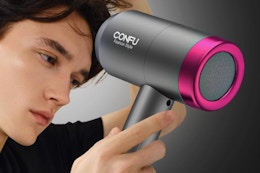 Man using an ionic blow dryer.