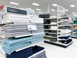 threshold bath rugs sitting on a target shelf