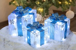 Christmas Decorations, Lauzior Set of 3 Christmas Lighted Gift Boxes in front of a Christmas tree.