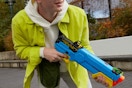 a man using a nerf gun