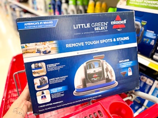 The Bissell Little Green blue machine in a red Target cart