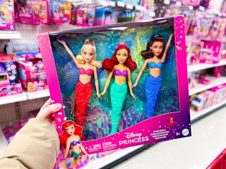 Disney Princess Doll 3-pack set held up in toy aisle in Target store