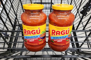 jars of ragu pasta sauce in shopping cart at kroger