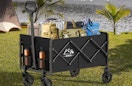 a wagon with bags on a camping site