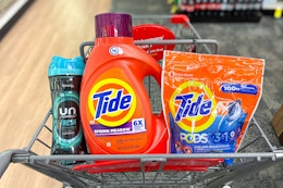 tide and downy laundry products in a cart