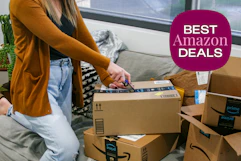 person opening an amazon box