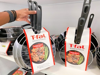 hand holding frying pan set