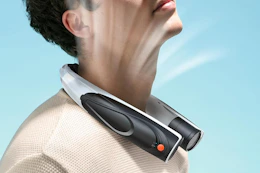 man wearing neck fan