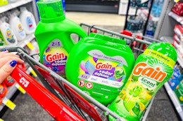 gain flings, detergent and scent beads in a cart