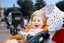 a baby with a stroller fan