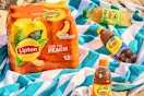 Lipton peach iced tea on a beach towel