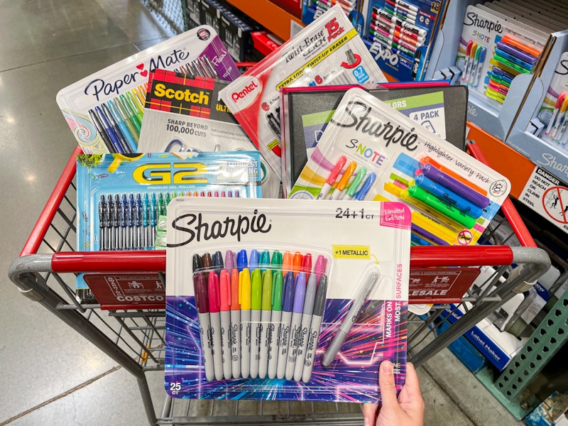 Basket full of office supplies at Costco