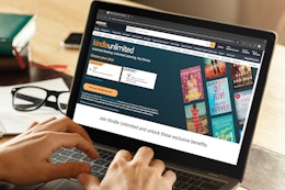 someone looking at the kindle unlimited webpage on amazon