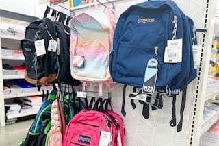 jansport backpacks on a store shelf