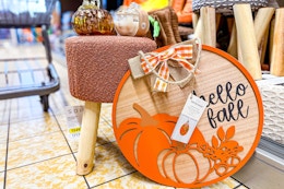New Fall Decor at Aldi: Ottomans, Candles, and More card image