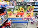 Little Tikes Cozy Coupe in Walmart shopping cart