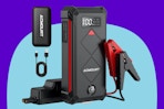 Acmount P100 Car Jump Starter on a blue background.