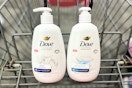 two bottles of dove hand wash in a shopping cart
