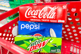 target soda 12 packs sitting in a target cart